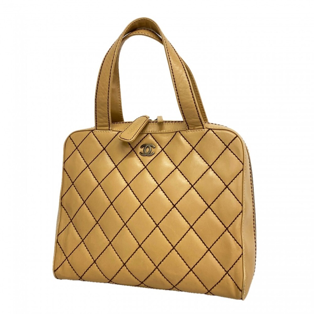 CHANEL Cream Lambskin Leather Bag